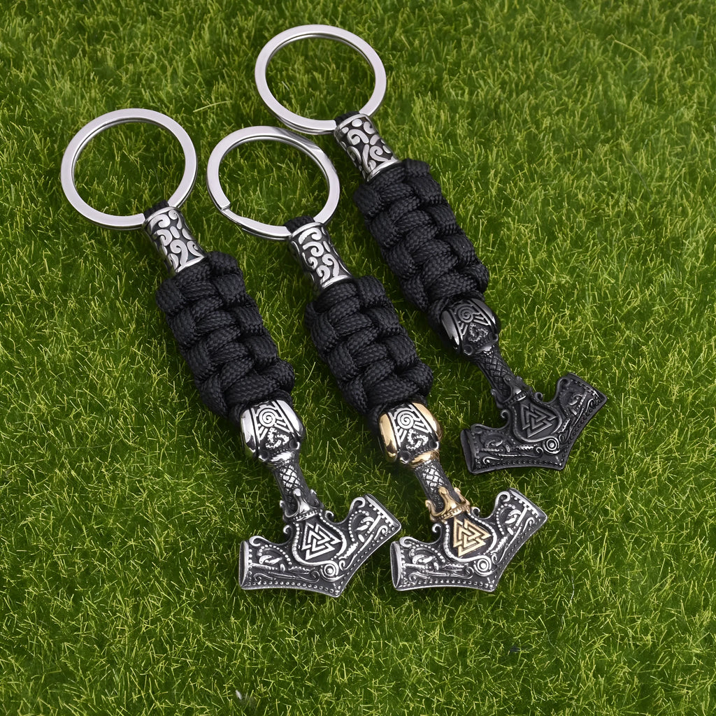 Viking triangle rune impactor keychain in stainless steel with animal motif, available in three metal finishes