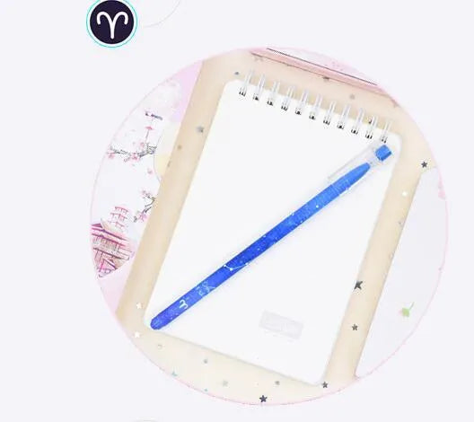 Box containing twelve constellation themed quick-drying gel pens for office use