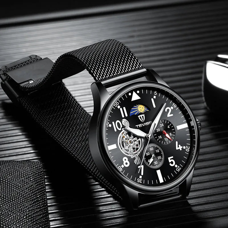 Men's black mechanical watch with skeleton caseback showing movement through transparent back
