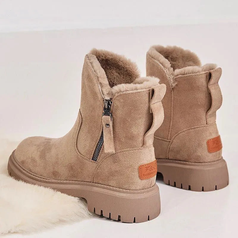 Women's black thick plush high-top snow boots with a side zipper and non-slip rubber sole.