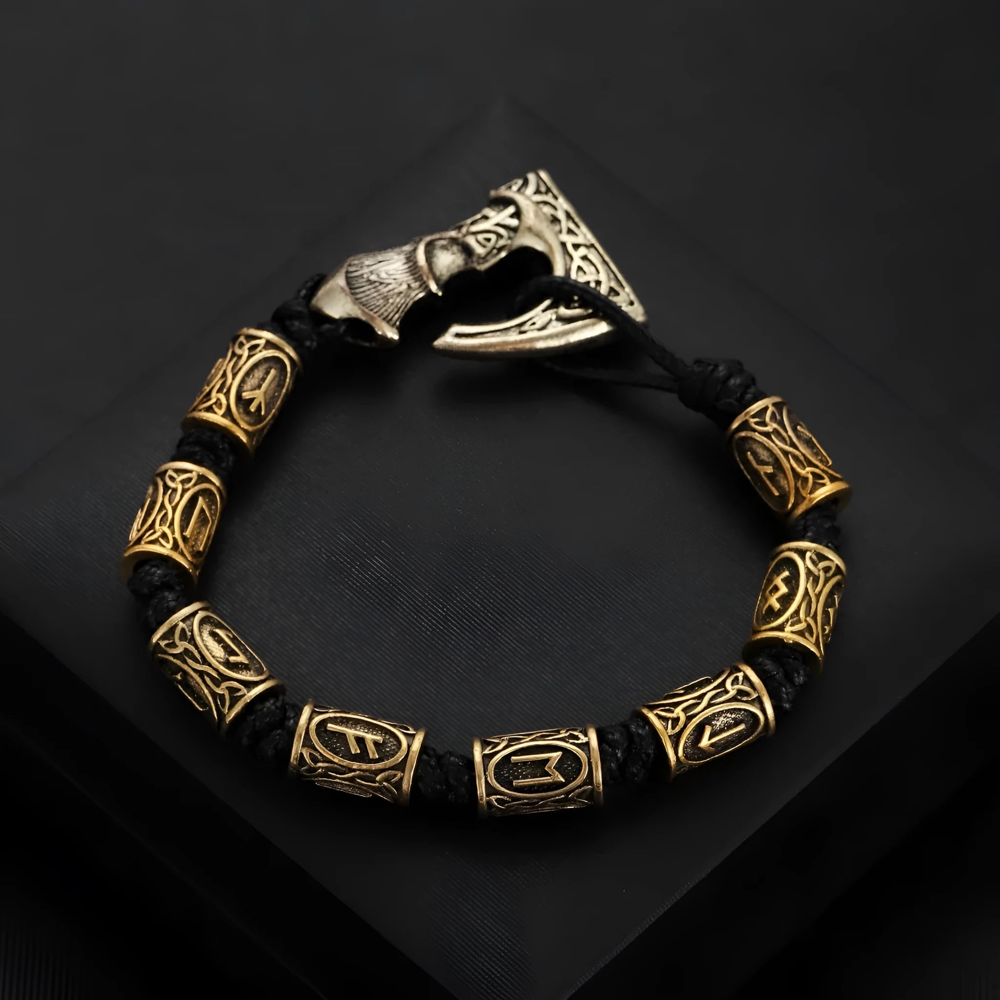 Handmade alloy rune lettering spacer beads woven bracelet on surface, three colour options available