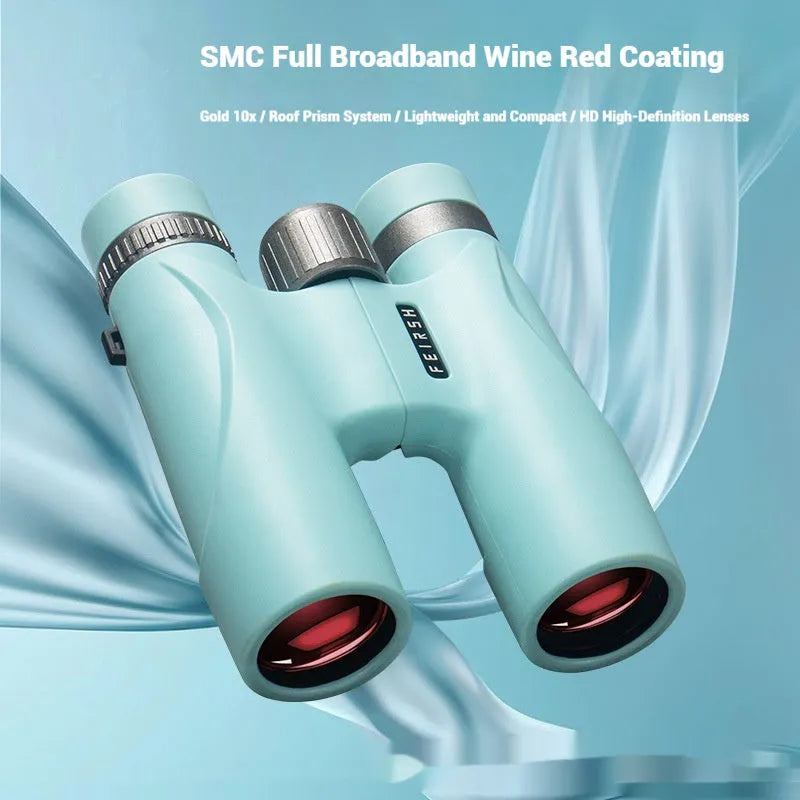 Blue and grey compact 10x32 binoculars with wine red film imaging on a table, showing 112mm size.