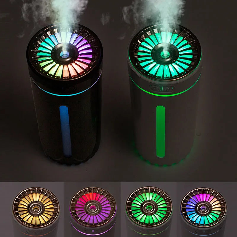 Black portable car humidifier with colourful lights on a car dashboard cup holder