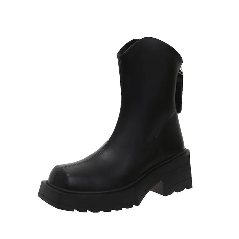 Black platform Martin boots for women with square toe, back zipper, and a high rubber sole.