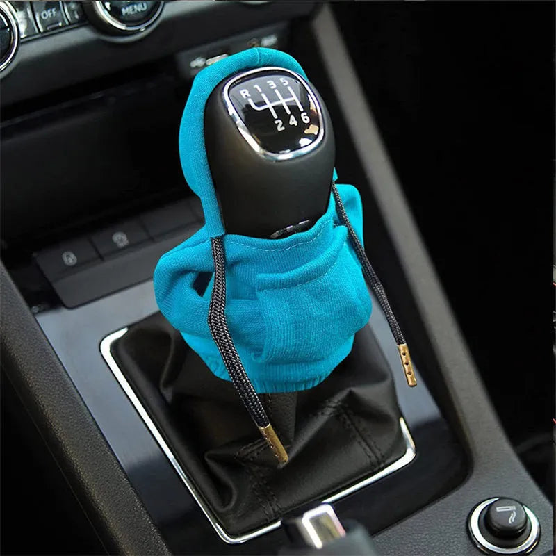 Universal 12cm pure cotton gear knob cover in hoodie style with adjustable drawcord, shown in black