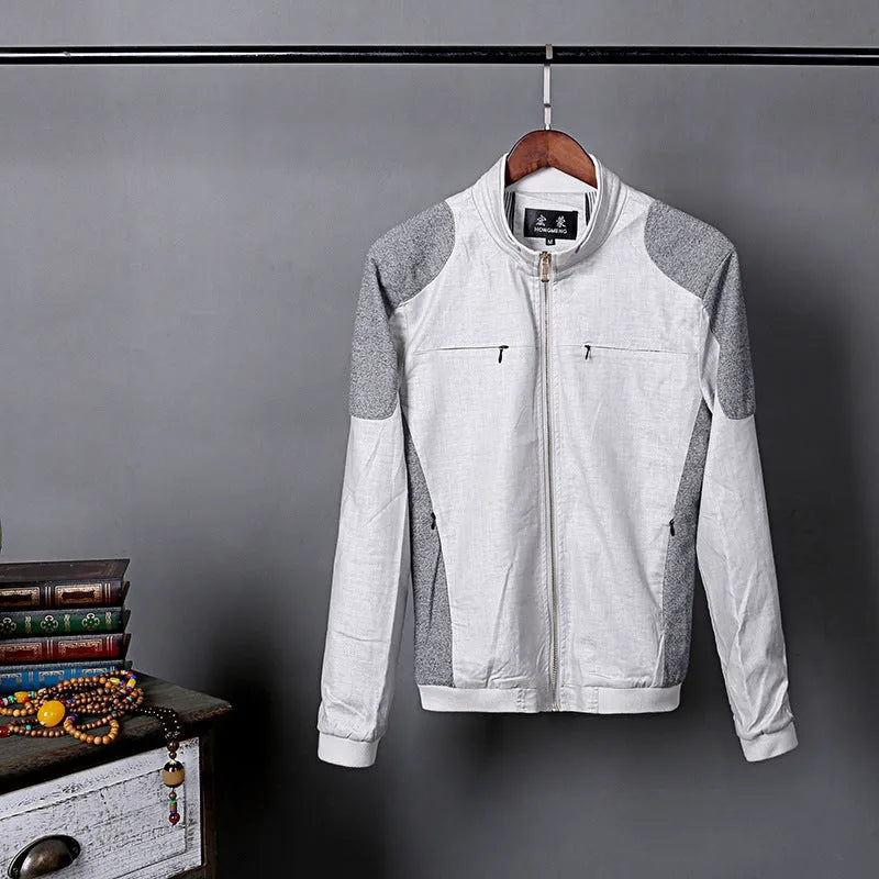 Men's lightweight blue linen jacket with a regular fit, hanging on a hanger.