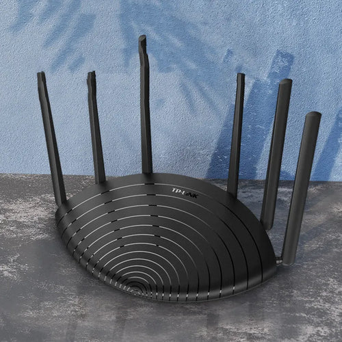 AC1900 Gigabit wireless router with compact black design showing easy-display interface
