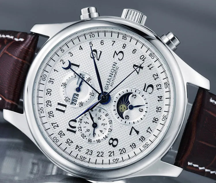 Men's black dial perpetual calendar mechanical watch with leather strap showing moon phase display