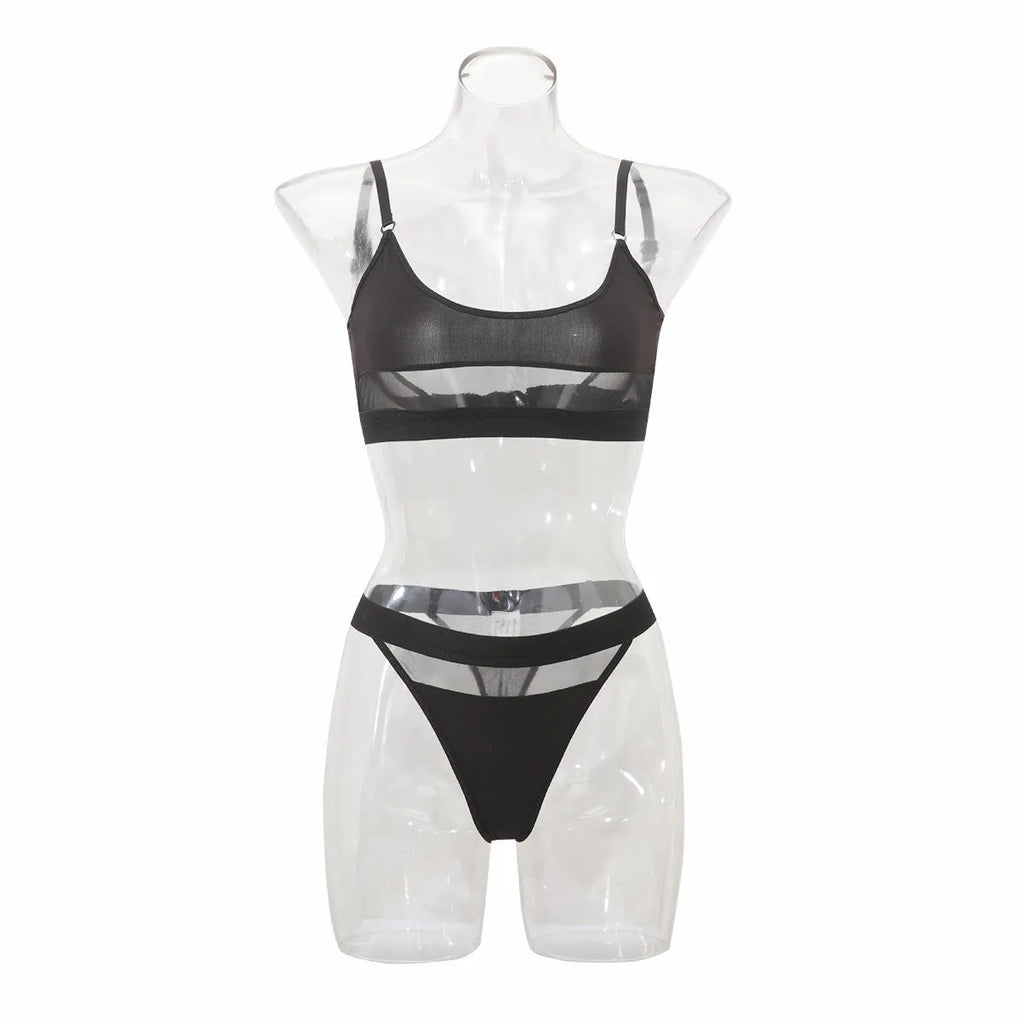 Black women's full cup bra and knicker set with adjustable straps on a white background