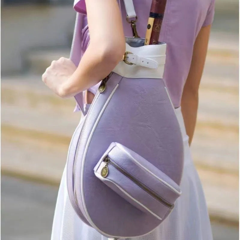 Women's vintage leather badminton bag with a one-shoulder strap in a selection of colours.