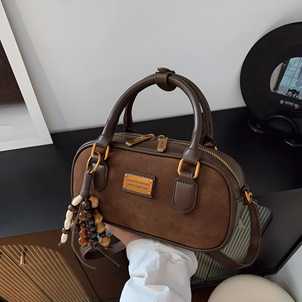 Niche PU one-shoulder messenger bag with stitching horizontal square shape and pendant
