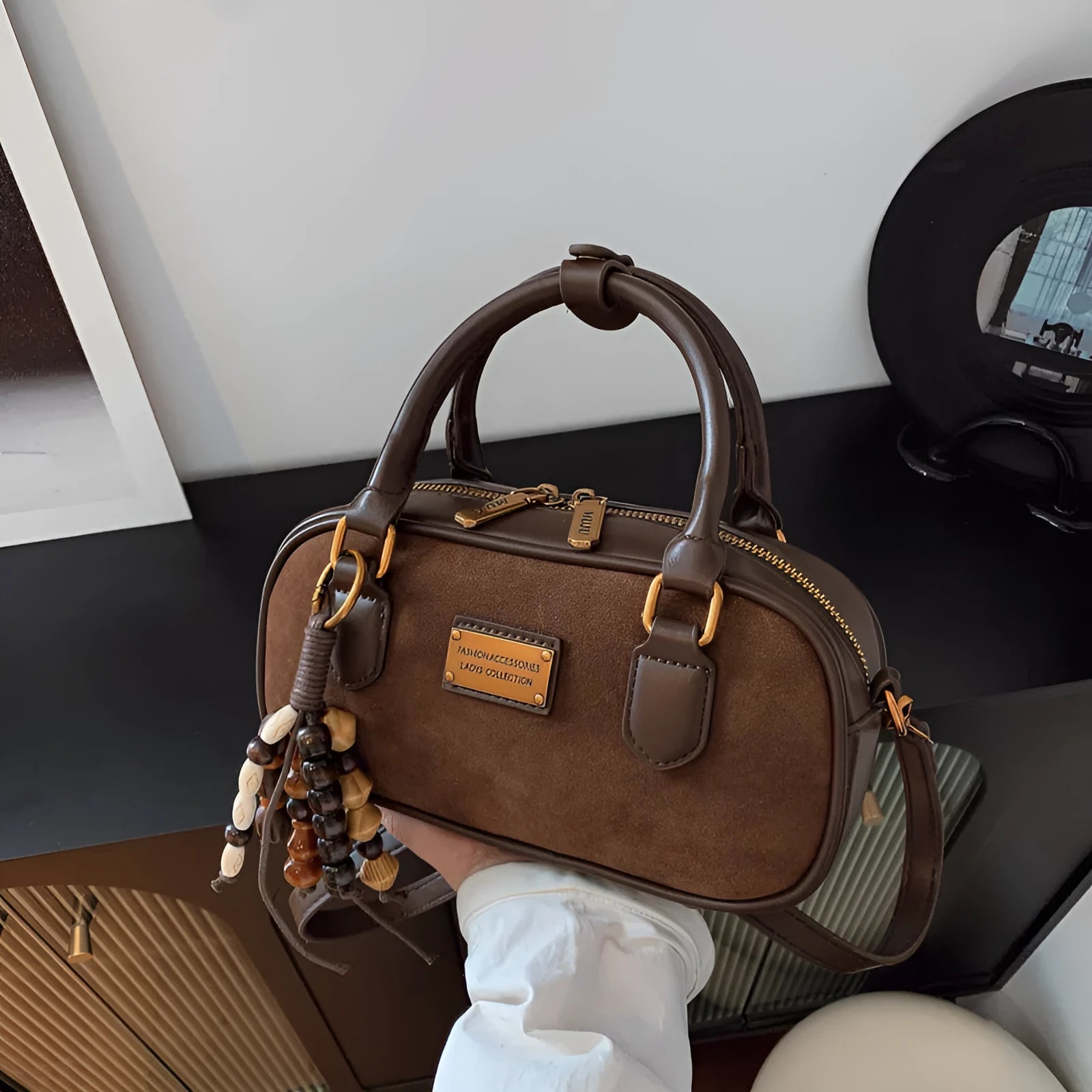 Niche PU one-shoulder messenger bag with stitching horizontal square shape and pendant