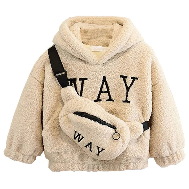 Child wearing a beige fleece hooded jacket with cartoon embroidery on the front.