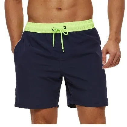 Men's blue stitching waist athletic shorts with a drawstring and zippered side pocket.