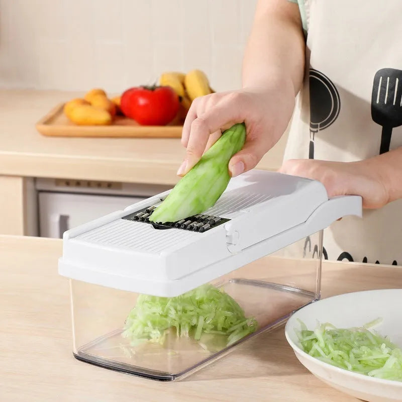 Multipurpose plastic vegetable cutter with 7 blades, drain basket, and hand guard in black colour