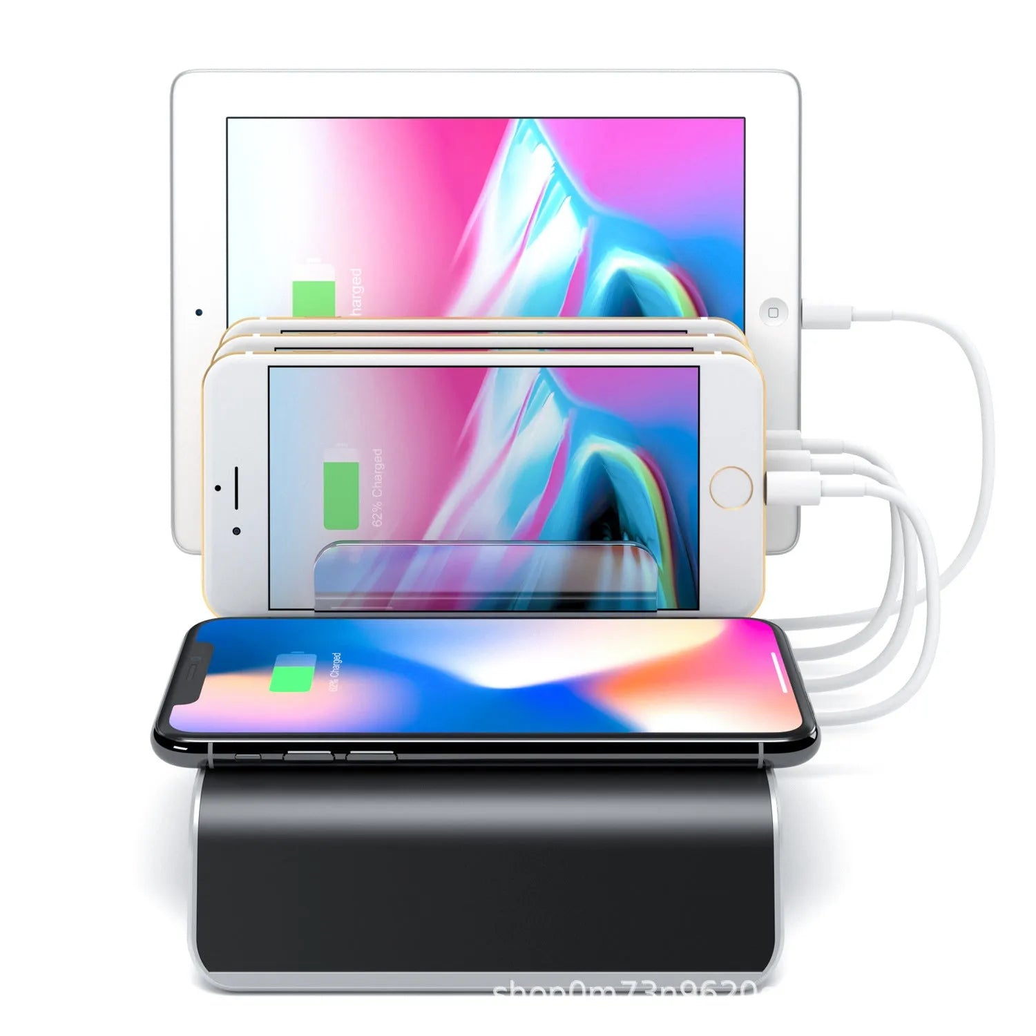 Black universal mobile phone and tablet charging stand on a desk.