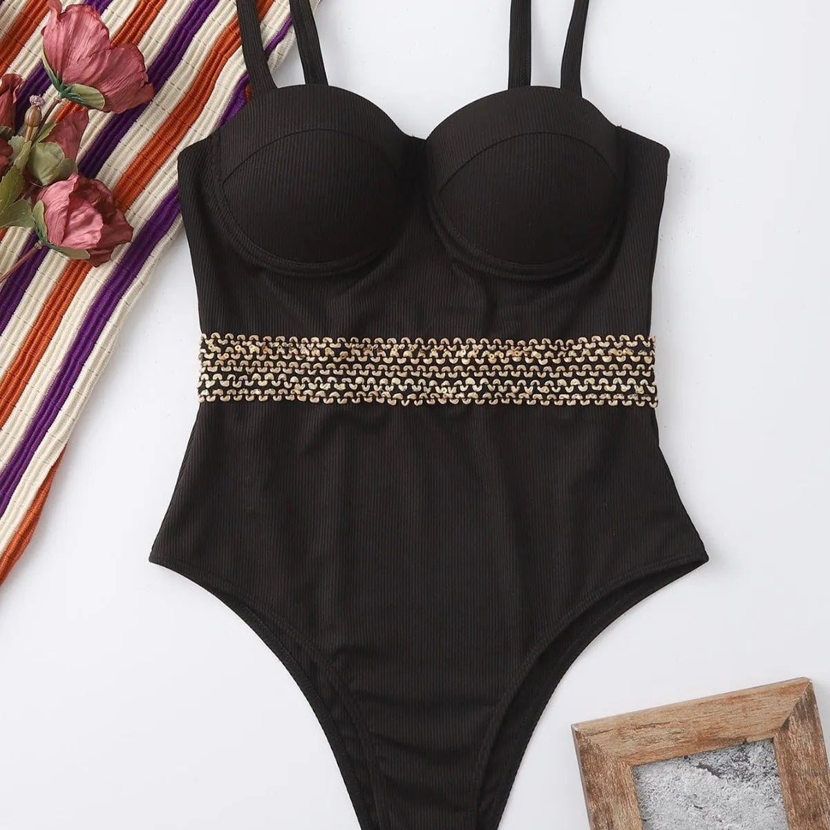 Black one-piece women's swimsuit with adjustable shoulder straps