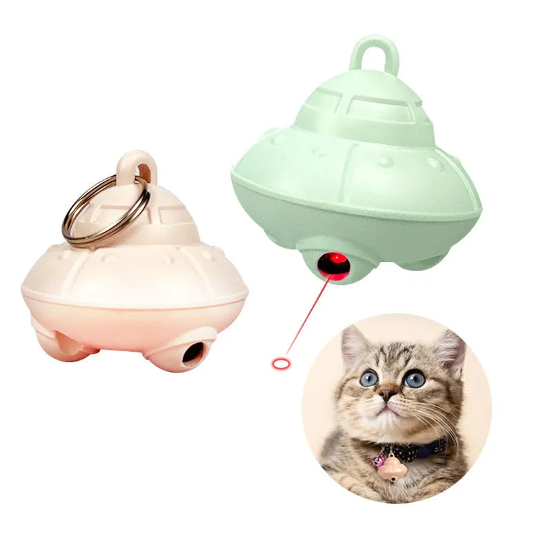 Green or pink cat collar laser toy with compact 3cm plastic housing showing USB charging port