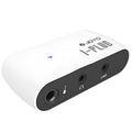 White metal distortion headphone amplifier unit measuring 93mm with connector and adapter