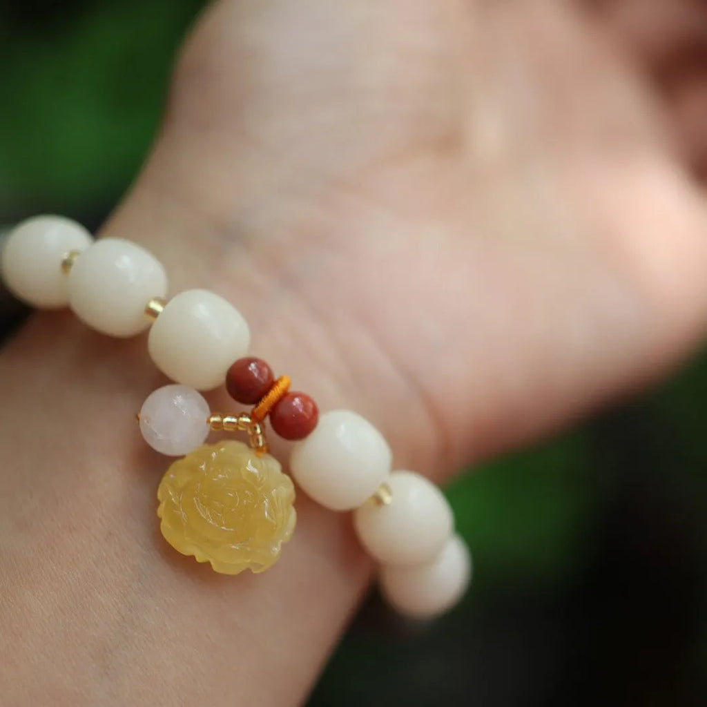Gradient white jade Bodhi root bracelet with 10mm flower beads and natural beeswax lotus detail