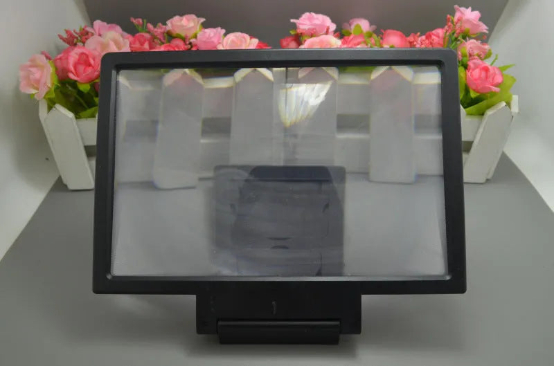 Black and white portable screen amplifier magnifier measuring 18cm long by 12cm wide