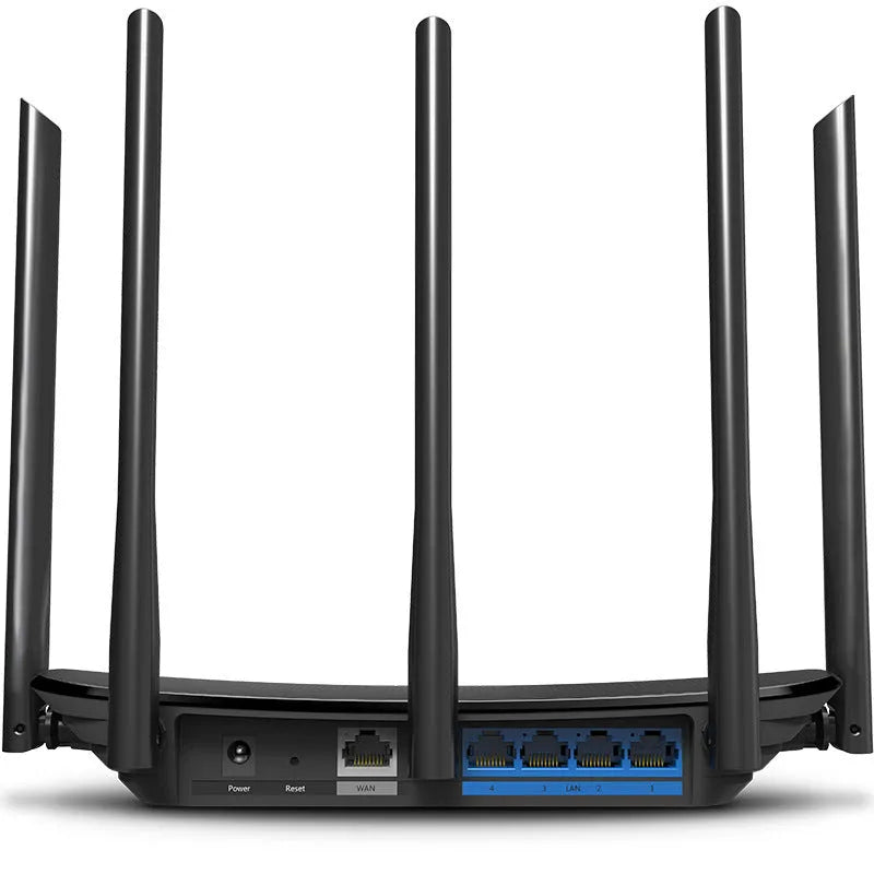 Black dual-band Gigabit wireless router with antenna and LED indicators on white surface