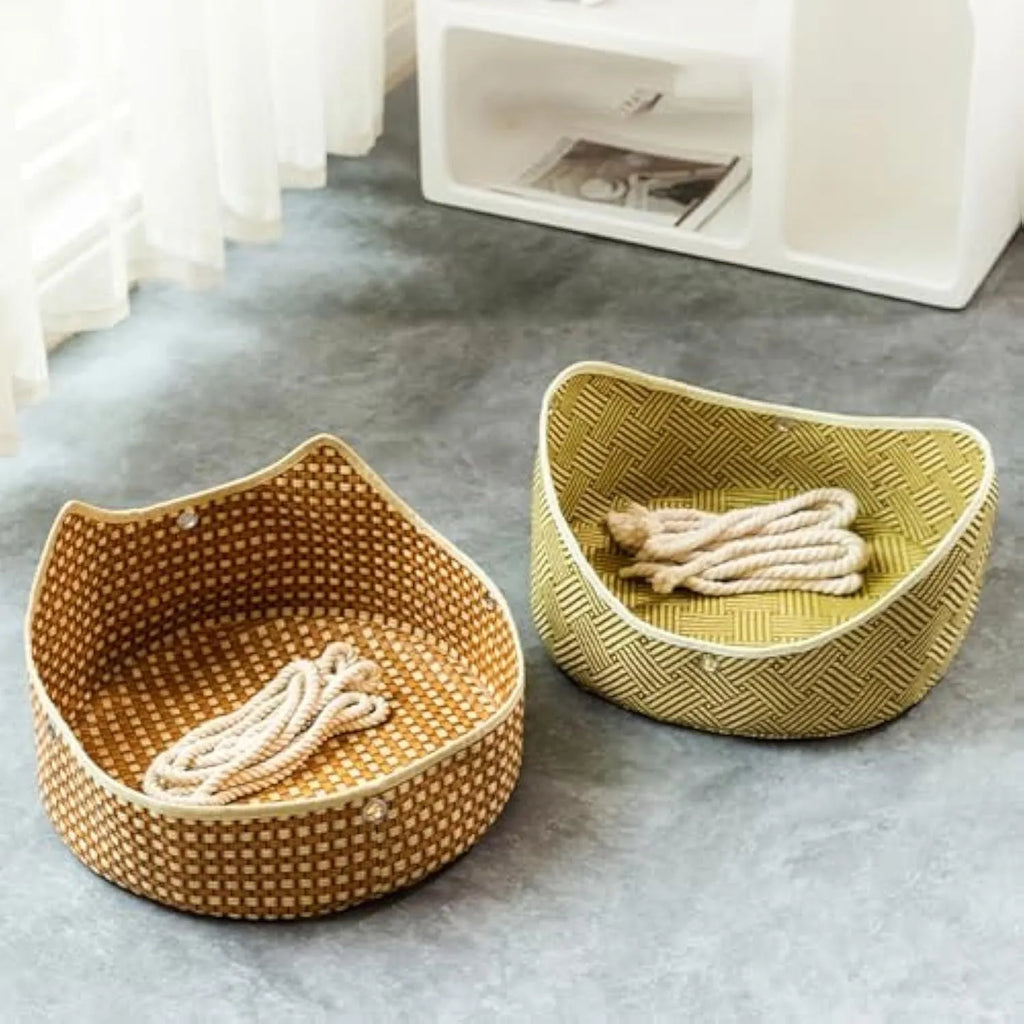 Green rattan cat hammock with cotton ropes and metal hooks, shown hanging