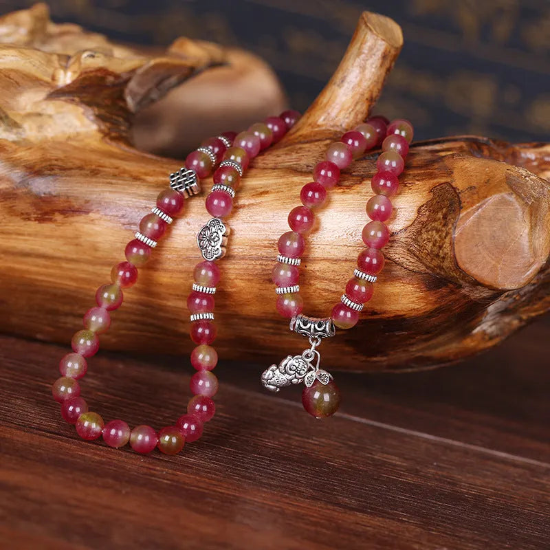 Handmade natural watermelon crystal bracelet with Chinese knot closure in national style.