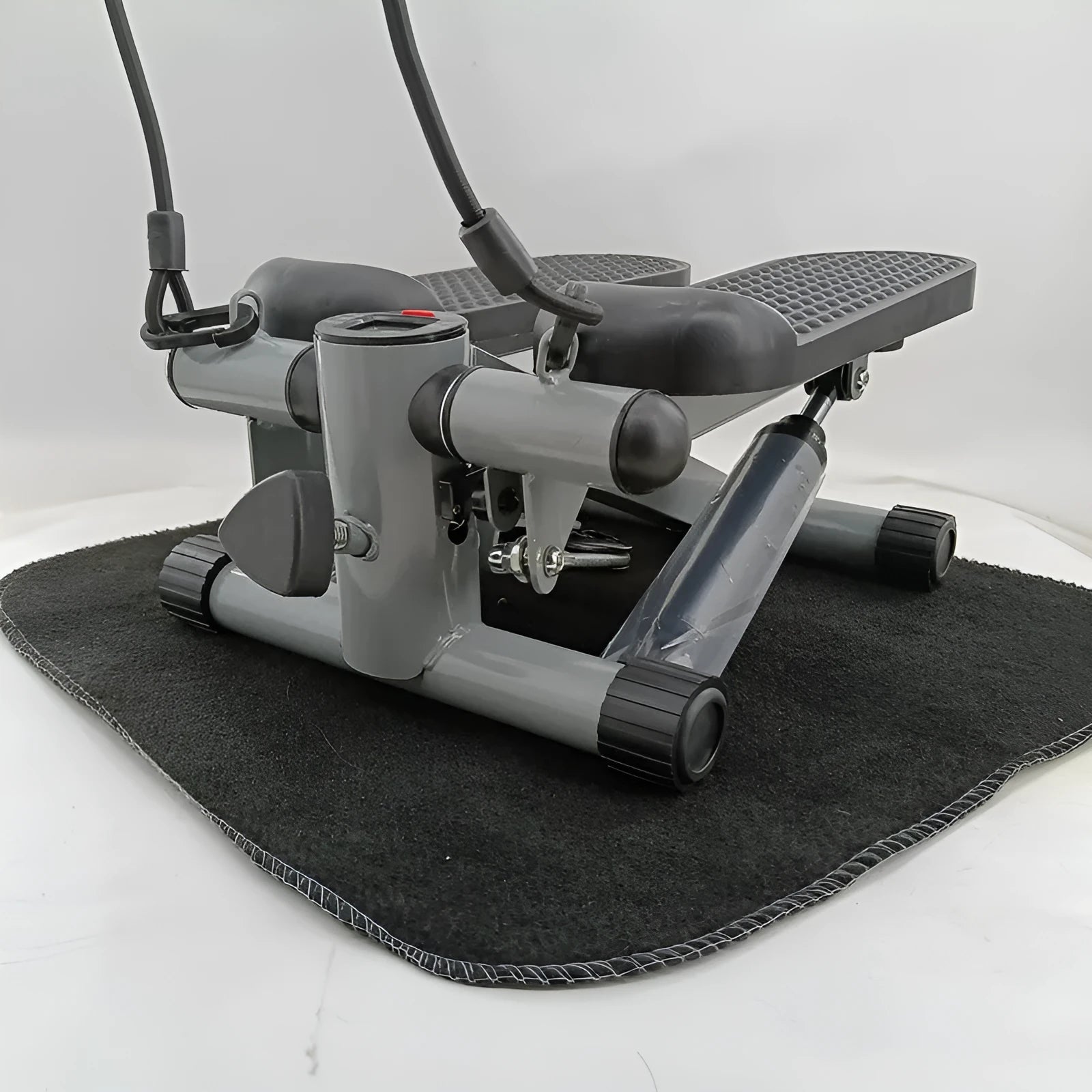 Silver grey household mini treadmill with hydraulic resistance and foldable pedals