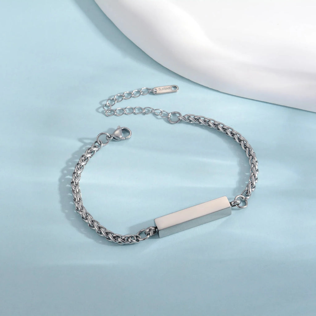 Unisex titanium steel rectangular column bracelet 6mm by 30mm on wrist, silver finish with extension chain