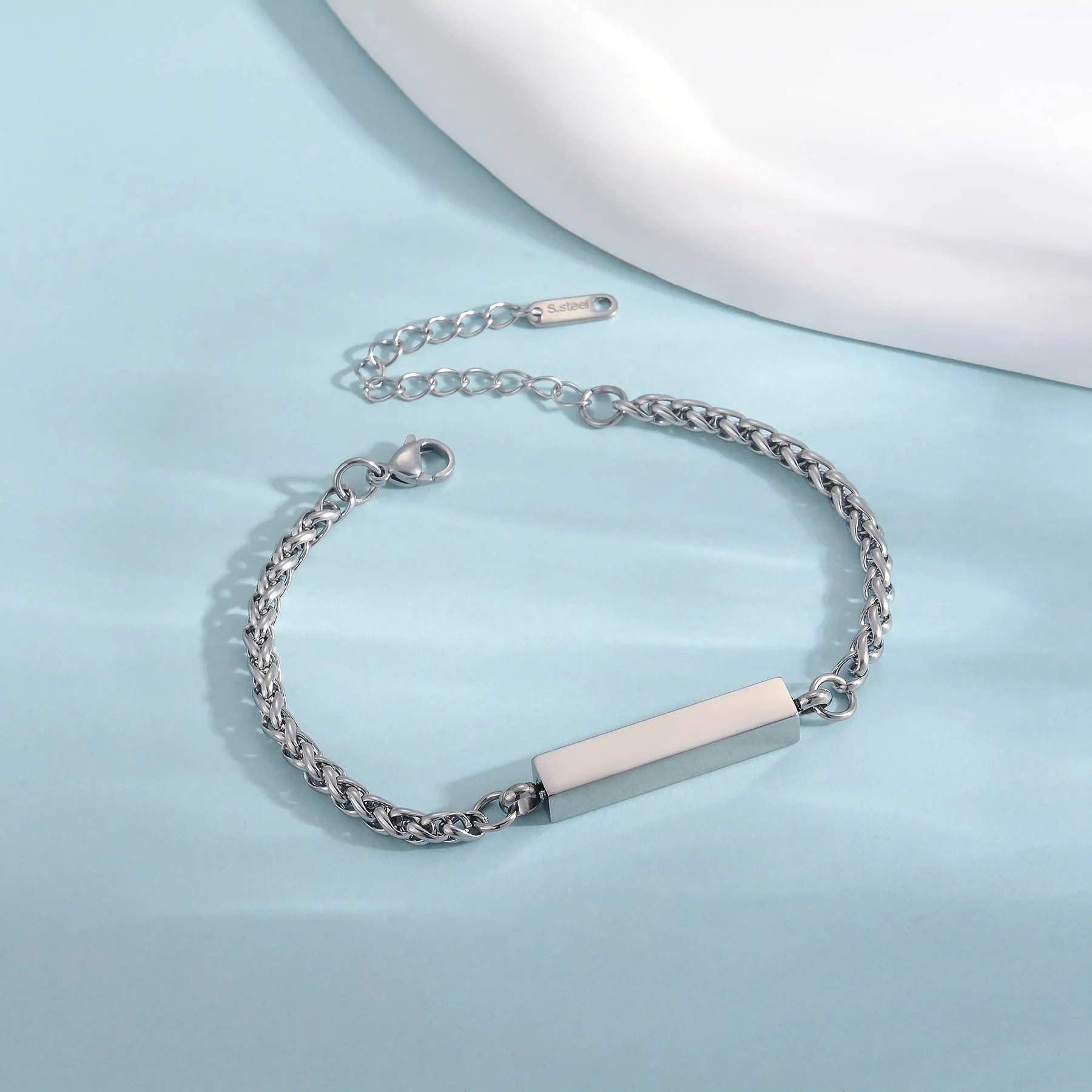 Unisex titanium steel rectangular column bracelet 6mm by 30mm on wrist, silver finish with extension chain
