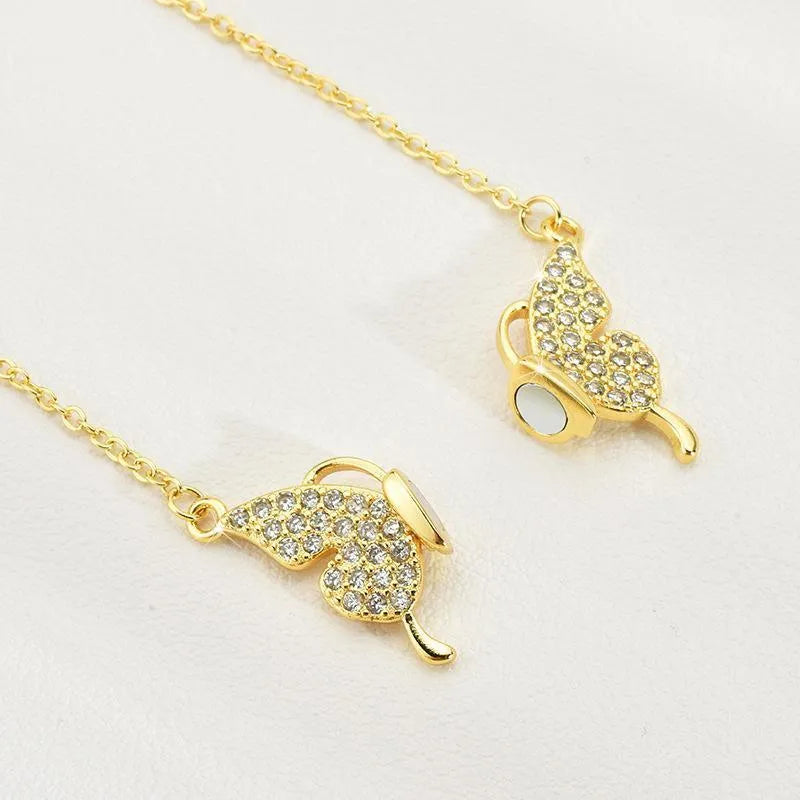Women's titanium steel clavicle chain with magnetic snap butterfly pendant in gold or silver finish