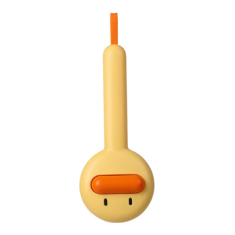 Small yellow duck-shaped pet grooming comb with open section design and needle teeth for cat and dog fur removal