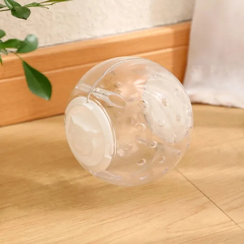 Blue ABS plastic slow feeding ball for dogs and cats, 11.5cm in diameter, on a plain background.
