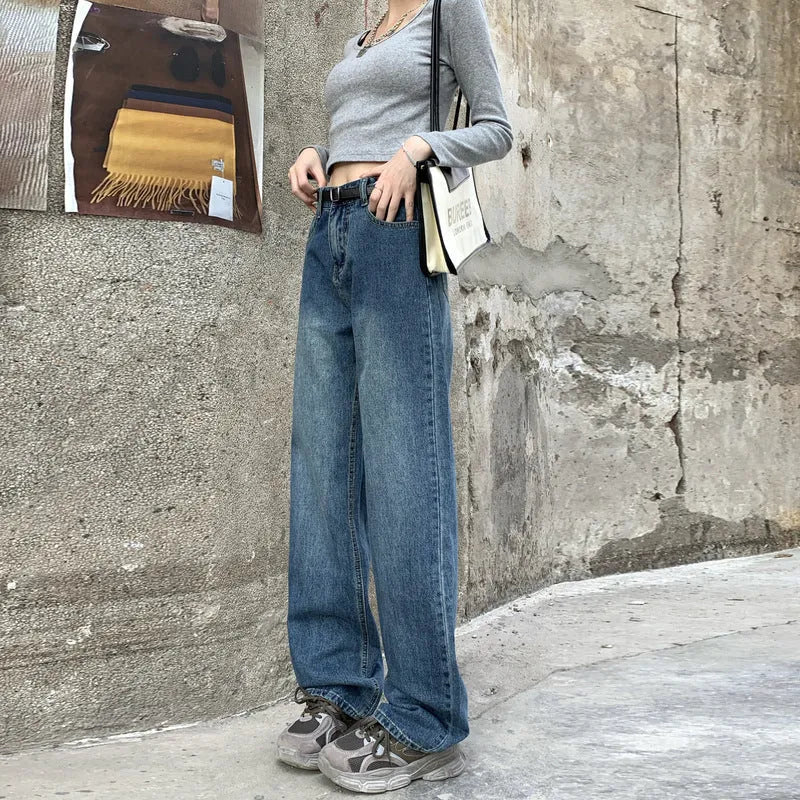 Women's Retro Blue high-waist straight-leg cotton denim jeans on a hanger.