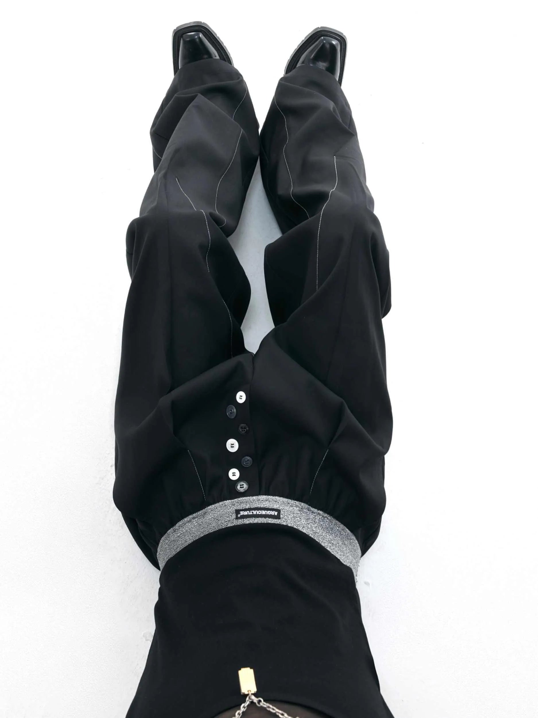 Straight-leg high-waisted casual trousers in grey with a button-open design line.