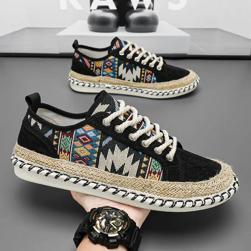 Men's beige and black cloth casual shoes with round toe, shown from the side.