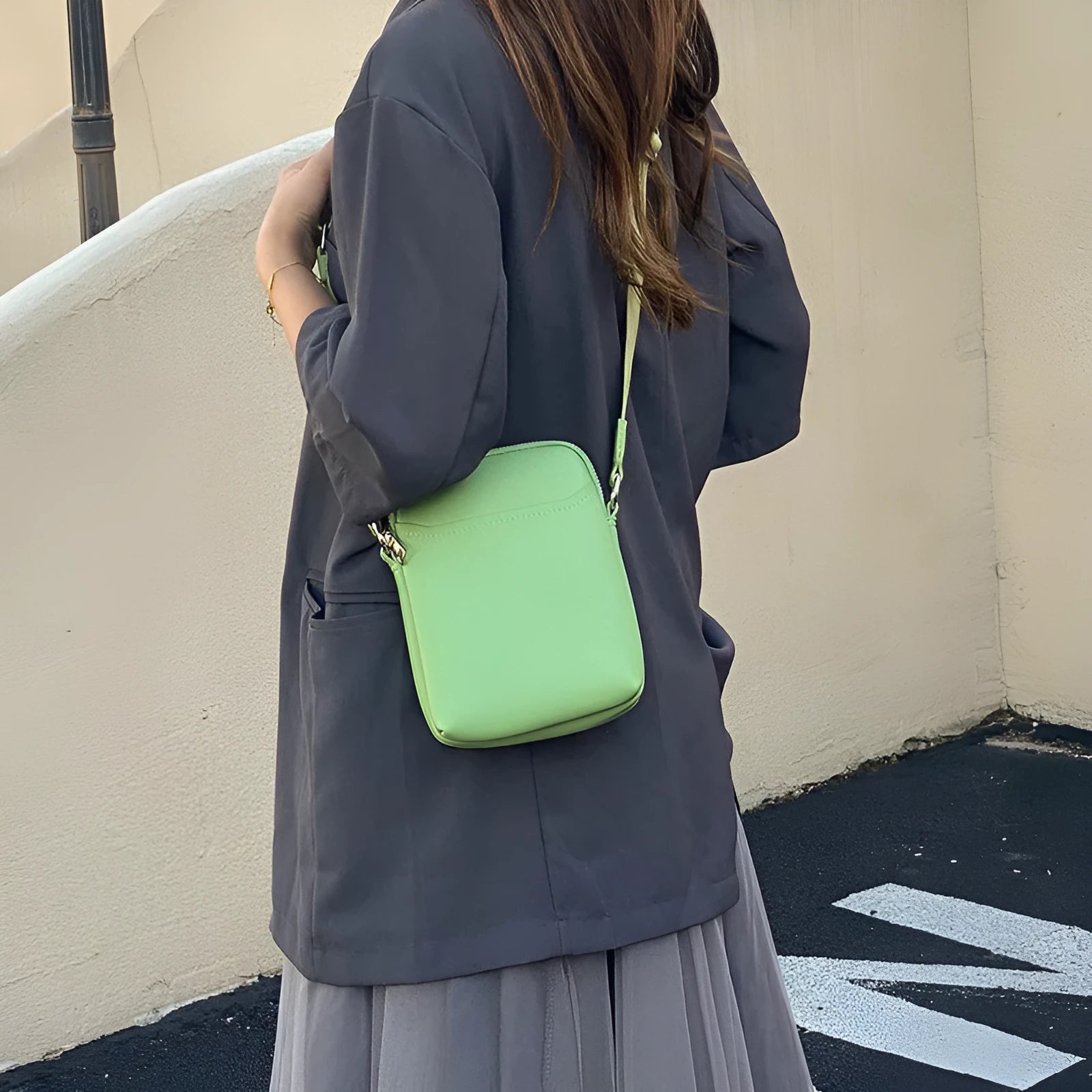 Solid colour small crossbody shoulder bag for mobile phones in beige.
