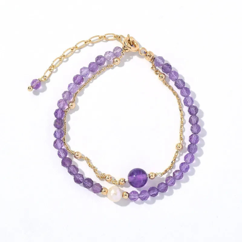 Chinese-style women's bracelet featuring genuine crystal and pearl beads with amethyst purple electroplated finish