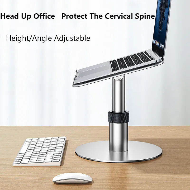 Silver aluminium car laptop stand with height adjustment and 360-degree rotating base on a car seat.