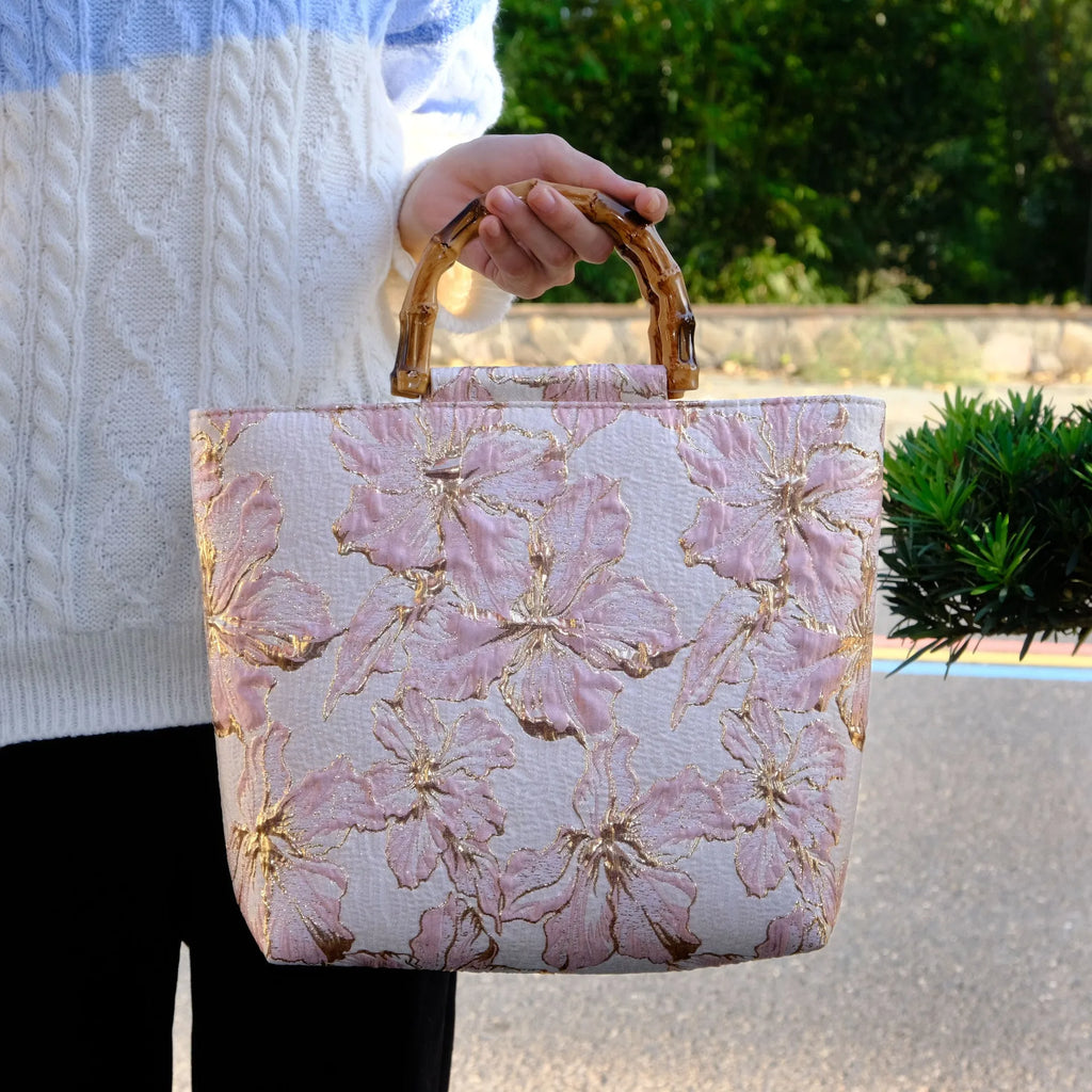 Light blue women's canvas shoulder bag with bronzing flower decorations measuring 30x30x10cm
