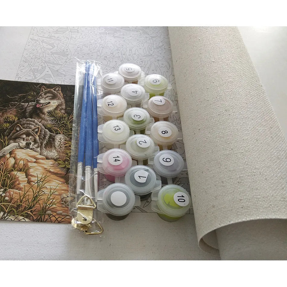 40x50cm paint by numbers kit showing printed linen landscape canvas, acrylic paint pots, and optional wooden stretcher frame.