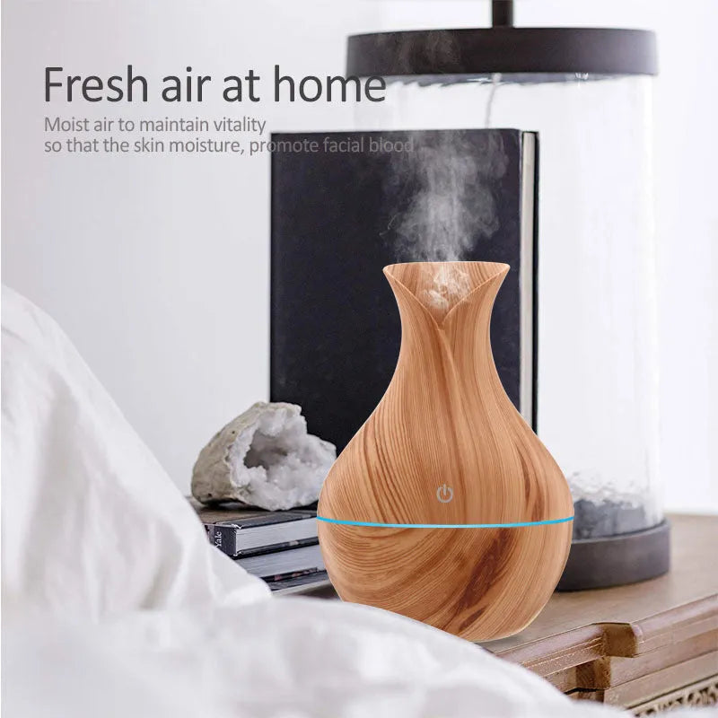 Vase humidifier 130ml 5V 3W in crackle mahogany or wood grain finish on a desk