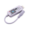 White WiFi RGB LED strip controller with Magic Home Pro app compatibility for smartphone lighting control