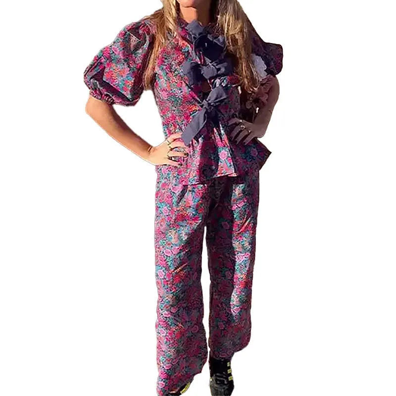 Women's floral print trouser suit set with puff sleeve blouse and matching trousers