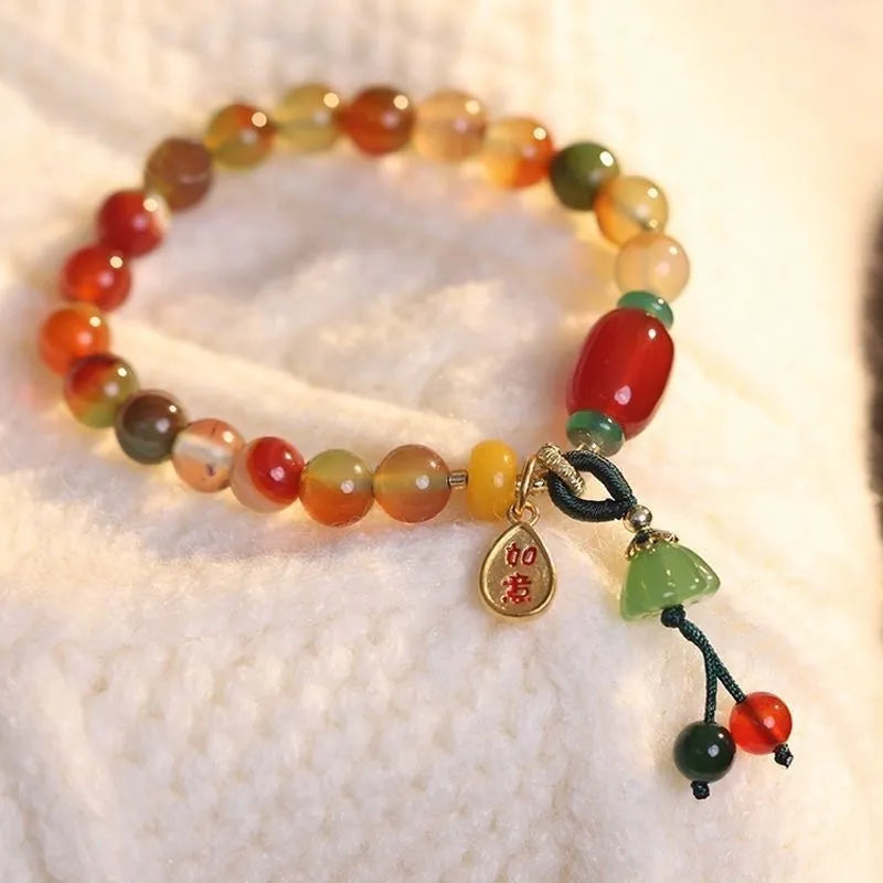 M990 Lotus Ruyi bracelet showing lotus decorative elements and mixed material construction