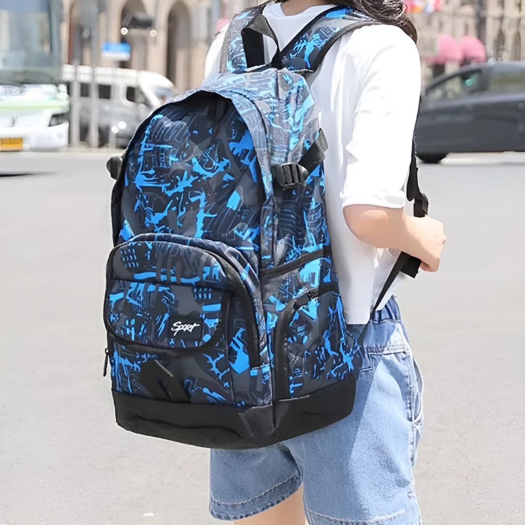 Classic large blue nylon backpack for school and travel displayed.