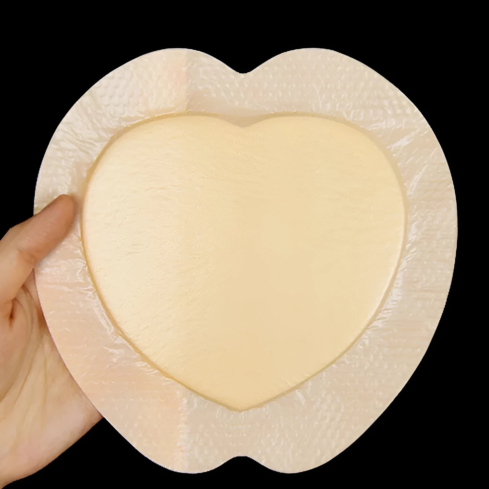 Large skin colour silicone gel foam bedsore and pressure relief dressing.