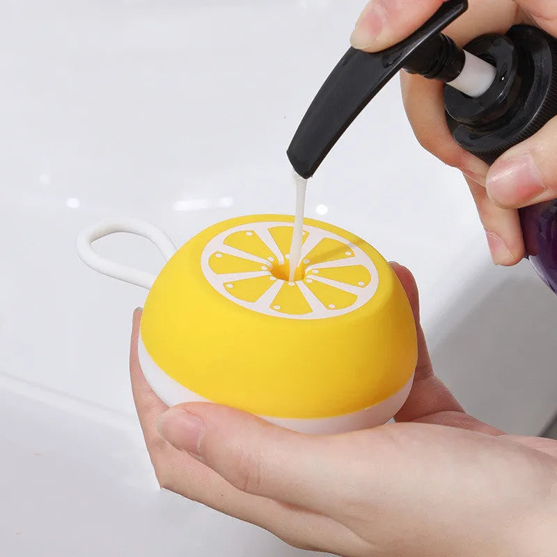 Yellow silicone pet bath brush with massage comb for dog and cat grooming measuring 102mm