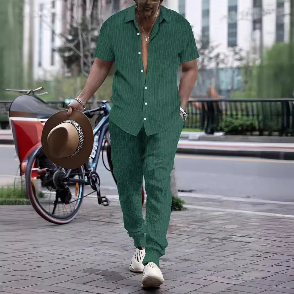 Men's loose-fit casual shirt and trousers suit in a cotton blend fabric, shown in a light blue colour.